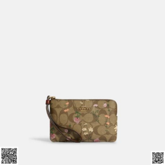美國代購正品 Coach Corner Zip 帆布小花手拿包