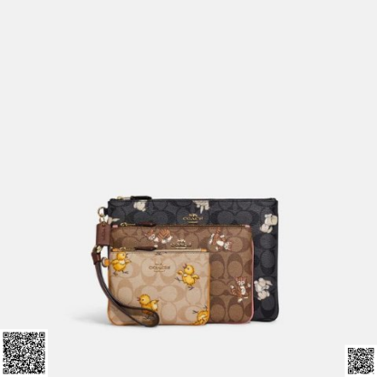 美國代購正品 Coach Trio 標誌性帆布配小動物印花手拿