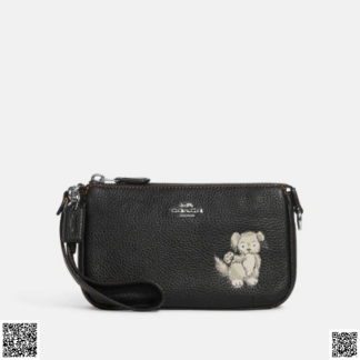 美國代購正品 Coach 快樂小狗印花Nolita 19 手拿包
